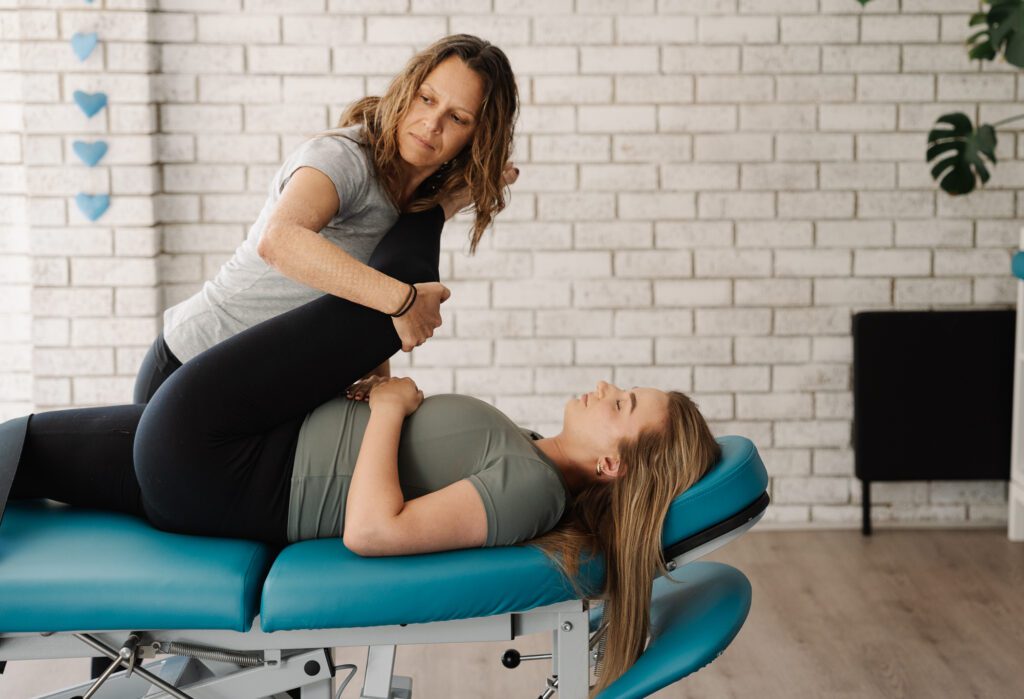 Stretch Therapist stretching a clients hamstring